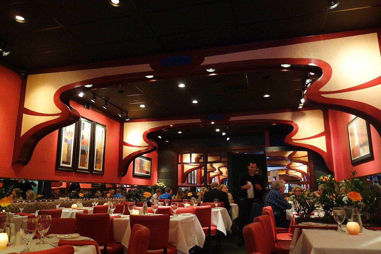 Restaurant dining room with warm ceiling lights